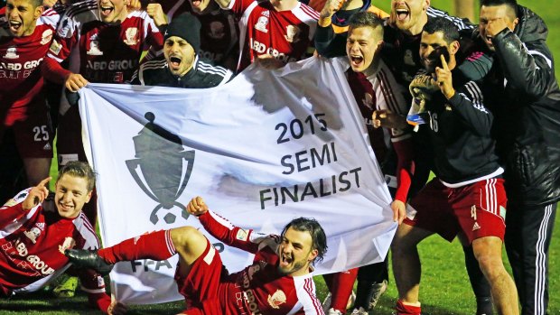 Hume City celebrate after winning the FFA Cup quarter-final against Oakleigh Cannons. 
