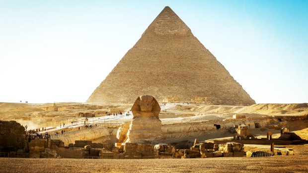 The Sphinx with The Great Pyramids of Giza.
