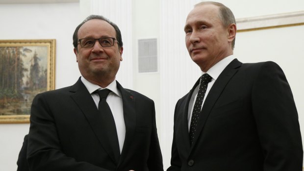 'Our enemy is Islamic State': French President Francois Hollande meets Russian President Vladimir Putin in Moscow on Thursday.