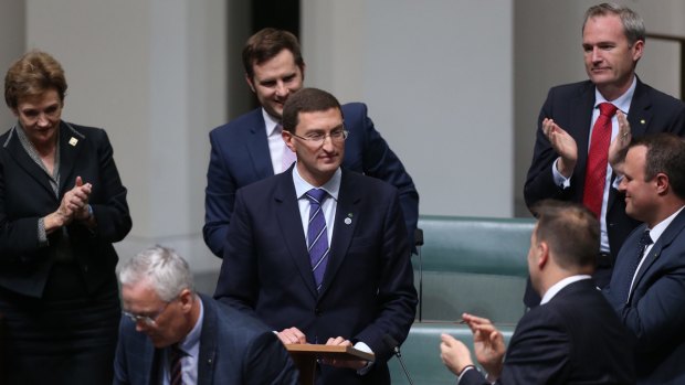 Mr Leeser is congratulated by other MPs after delivering his first speech.