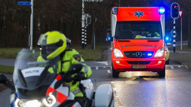 An ambulance carrying a UN peacekeeper with Ebola arrives at the University Medical Centre in Utrecht, the Netherlands.