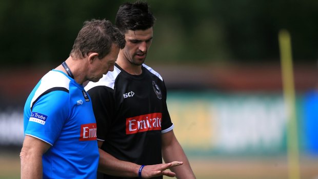 Scott Pendlebury with new assistant coach Garry Hocking.