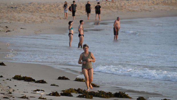 Sydneysiders hit the beach at Coogee early on Wednesday morning. 