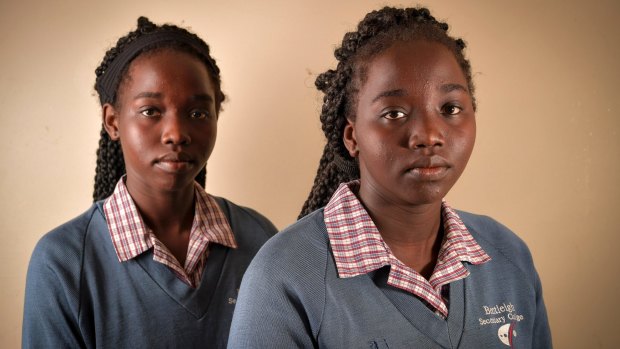 Tahbisa (right) says braiding makes her hair healthier and easier to manage.
