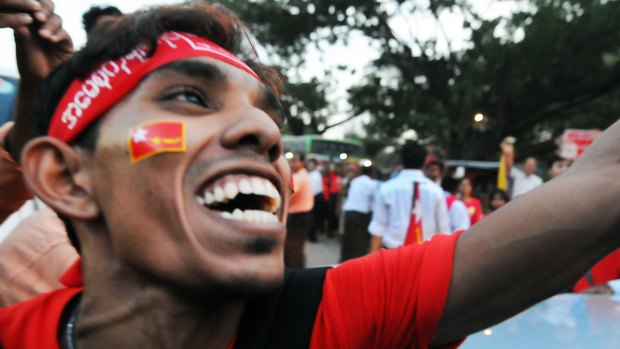 An enthusiastic NLD supporter at Aung San Suu Kyi's final election rally in Yangon on Sunday.