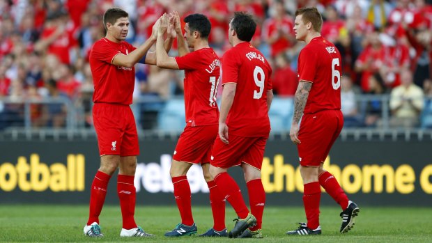 On target: Liverpool Legends celebrate Luis Garcia's goal.