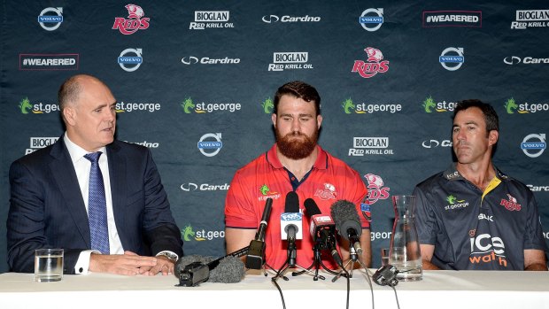 Under scrutiny: Reds chairman Rod McCall with James Horwill and coach Richard Graham. The Queensland powerbroker will have to answer questions from club bosses over a new funding structure.