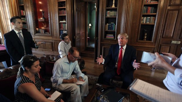 Donald Trump answers questions about his bid for the US presidency in Albemarle House, a property of his outside of Charlottesville, Virginia, on Tuesday.