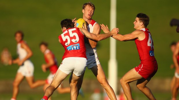 Callum Mills is tackled during the Sydney Swans intra-club match last month.