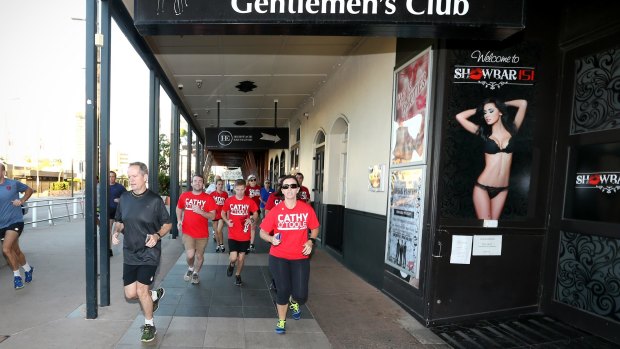 Opposition Leader Bill Shorten during a morning run with Labor supporters in Townsville on Saturday. 