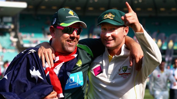 Happy days: Darren Lehmann and Michael Clarke celebrate the Ashes whitewash in 2014.