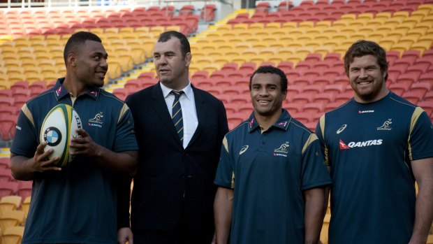 Awesome foursome: Samu Kerevi, Michael Cheika, Will Genia and Greg Holmes during the Australian Wallabies squad announcement in Brisbane.