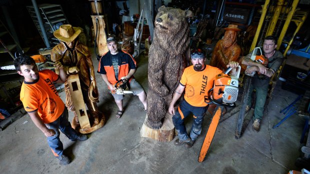 Chainsaw sculpting competitors (from left) Brandon Kroon, Steve Kenzora, Robby Bast and Leigh Conckie.