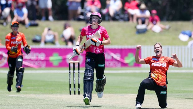 Gone: Katherine Brunt picks up the wicket of Sarah Aley on Tuesday.