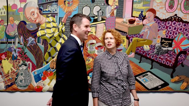 NSW Premier Mike Baird with MCA Director Elizabeth Ann Macgregor in the exhibition by Grayson Perry on the day of the museum's Millionth visitor for 2015.
