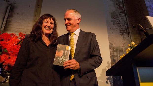 Joan London receives the Prime Minister's Literary Award for Fiction from Malcolm Turnbull.