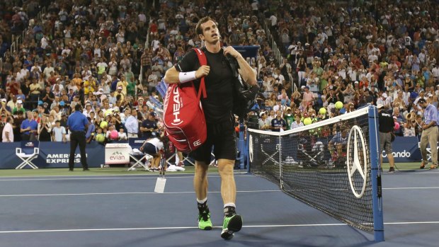 Andy Murray walks off the court after losing in the fourth round of the US Open.