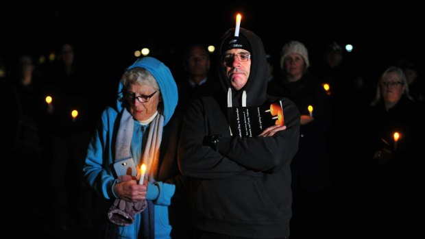 Tara Costigan's grandmother Margaret Costigan and uncle Michael Costigan at the candle lighting ceremony for the National Day of Remembrance at Commonwealth Park in Canberra.