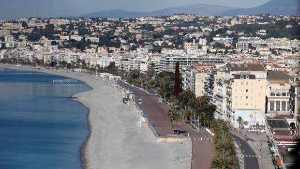 The virtually deserted Promenade des Anglais avenue along the beach in Nice, France.
