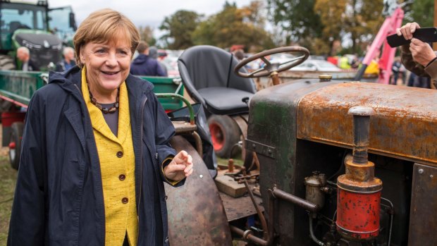 German chancellor Angela Merkel arrives at the harvest festival in Lauterbach, Germany on Saturday. 