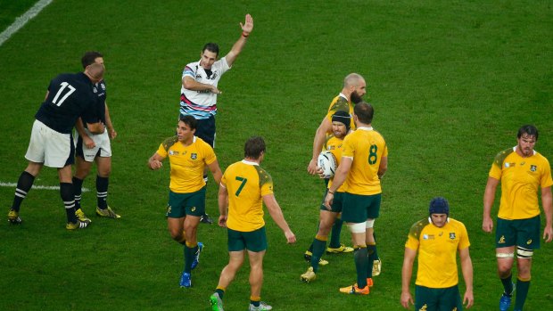 Quarter-final controversy: Referee Craig Joubert awards Australia a late match-winning penalty in their match against Scotland.