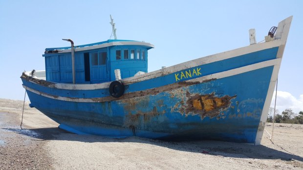 The Kanak, the boat that was stranded on the reefs near Landu Island after Australian officials allegedly paid people smugglers to return to Indonesia.