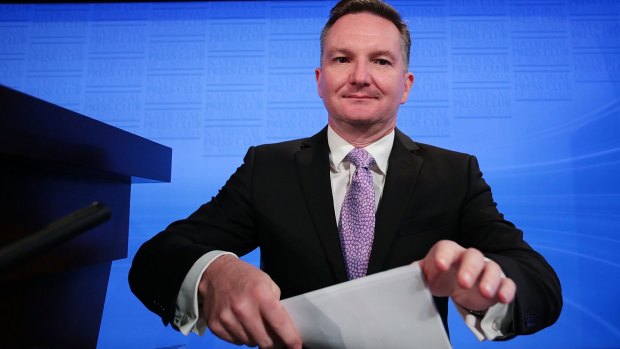 Chris Bowen prepares to deliver his budget reply address at the National Press Club.