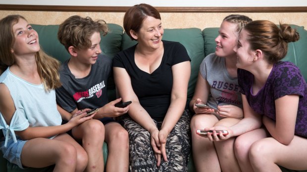 Megan Hogg's four children –
 (from left) Danika Klinkenberg, Harrison Klinkenberg, Emily Hogg and Nicola Hogg – are paid their pocket money through an app.