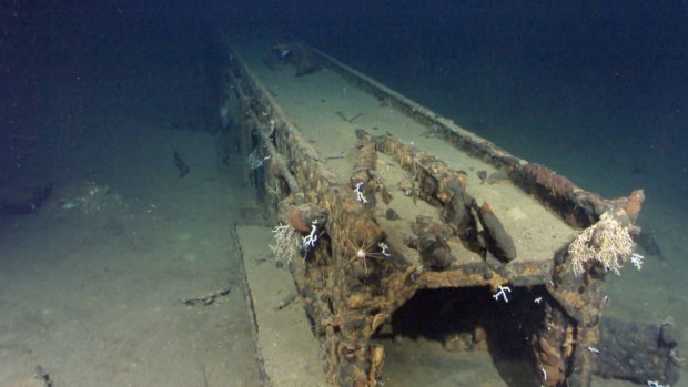 Metal that looks like a catapult used to launch float planes from the World War II battleship Musashi.