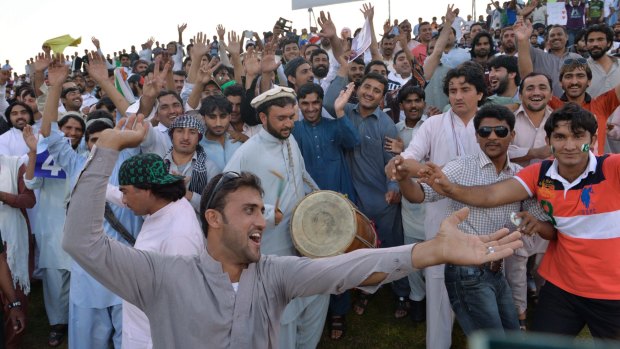 Pathans dance during the fifth one-day international match between Pakistan and New Zealand.
