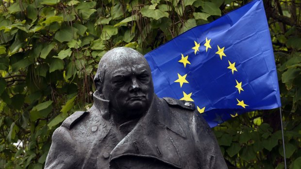 A European Union flag hung behind the statue of former British prime minister Winston Churchill, as part of pro-Europe protests in London.