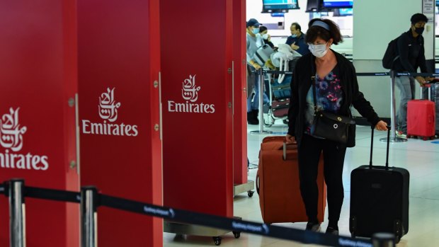 Passengers check in for an Emirates flight departing Sydney Airport in January. Special permission must be obtained from Border Force in order to be allowed to leave.