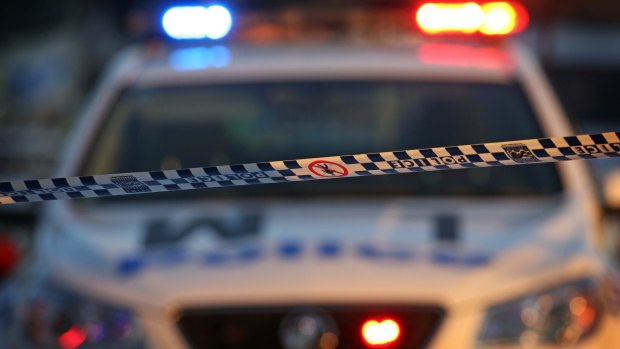 A man armed with a knife has threatened a female postal worker in Kingston at lunch time on Monday.