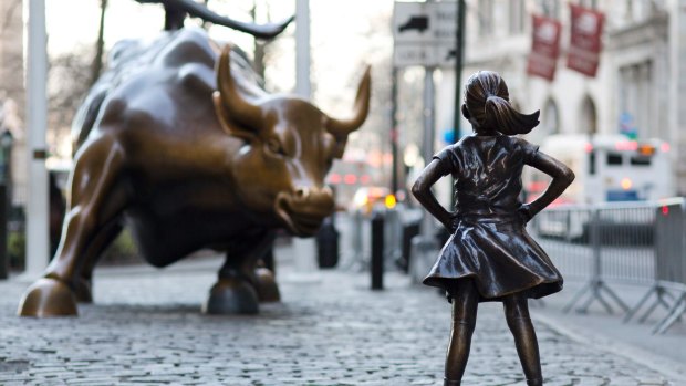 "Charging Bull" and "Fearless Girl" face off against each other in New York.