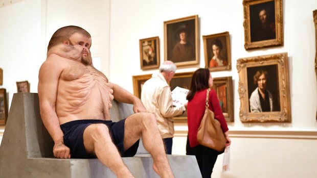 Patricia Piccinini's sculpture Graham (foreground) and old master paintings at the Castlemaine Art Museum, which will close on August 11. 
