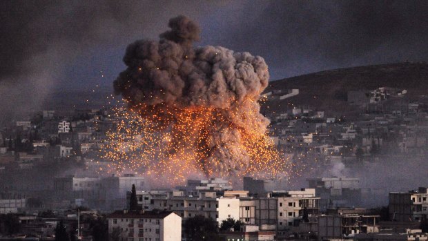 An explosion rocks the Syrian town of Kobane during a battle between Islamic State and the Kurdish forces last year.