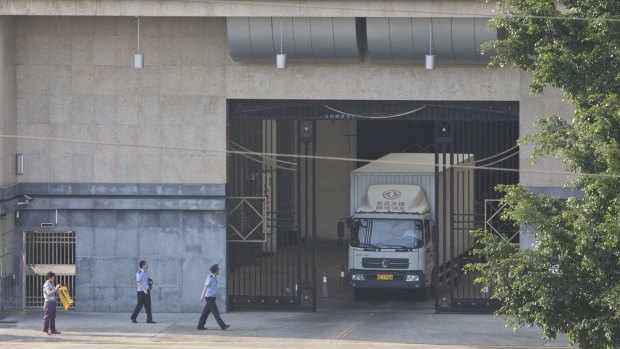 A truck pulls out of the Dongguan Prison in Dongguan, Guangdong Province, China.