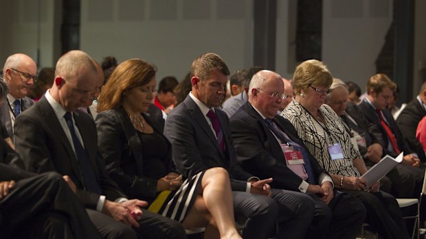 Premier Mike Baird (centre) at a pre-election "Make it Count" event for homeless and disadvantaged youth at the Village Church in Annandale.