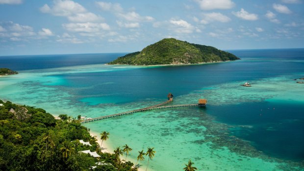 Bawah's tranquil lagoon offers plenty of marine activities.