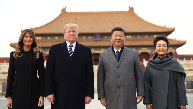 From left: US first lady Melania Trump, US President Donald Trump, Chinese President Xi Jinping and his wife Peng Liyuan tour the Forbidden City in Beijing.