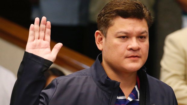 Paolo Duterte takes his oath in a continuing Senate probe into drug importation on September 7.