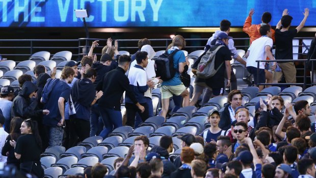 Melbourne Victory fans walk out during the round eight A-League match against Adelaide.
