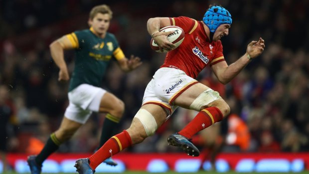 Impressive: Justin Tipuric makes a break to score a try for Wales against the Springboks.