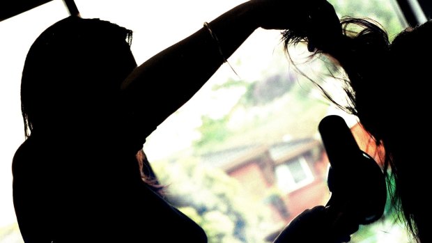 Hairdressers may be recruited to help combat domestic abuse.