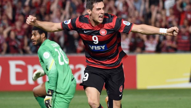Tie-breaker: Tomi Juric celebrates scoring the only goal of the game.