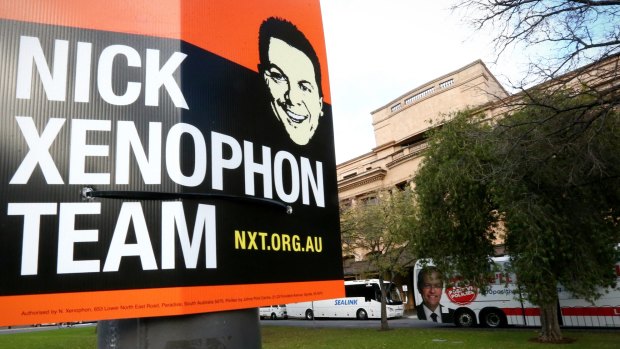 Nick Xenophon Team corflutes line the streets in Adelaide.
