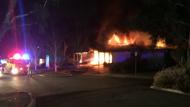 Local Ben Langley saw fire crews tackling the Kambah church blaze at 6:15am while he was out walking his dog.