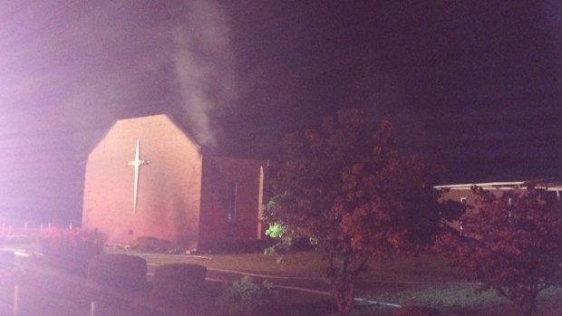 Smoke rises from Mount Zion African Methodist Episcopal church near Greeleyville, South Carolina, which caught fire Tuesday.