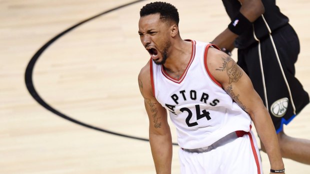 Toronto Raptors guard Norman Powell  reacts after dunking.