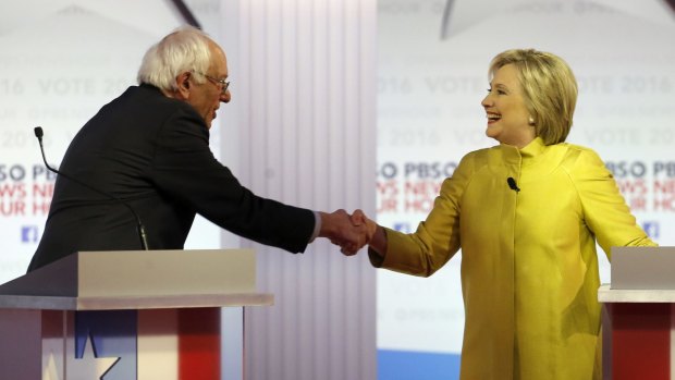 Bernie Sanders and Hillary Clinton shake hands after the debate at the University of Wisconsin-Milwaukee.
